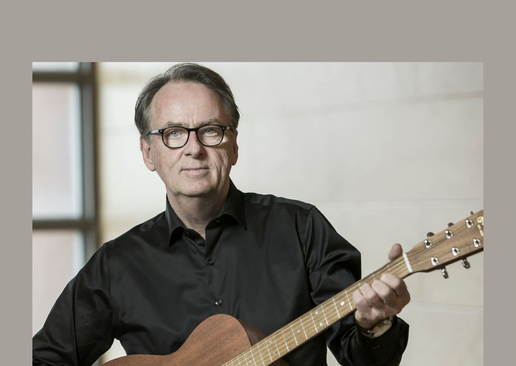 Portrett av Roland Utbult med gitar