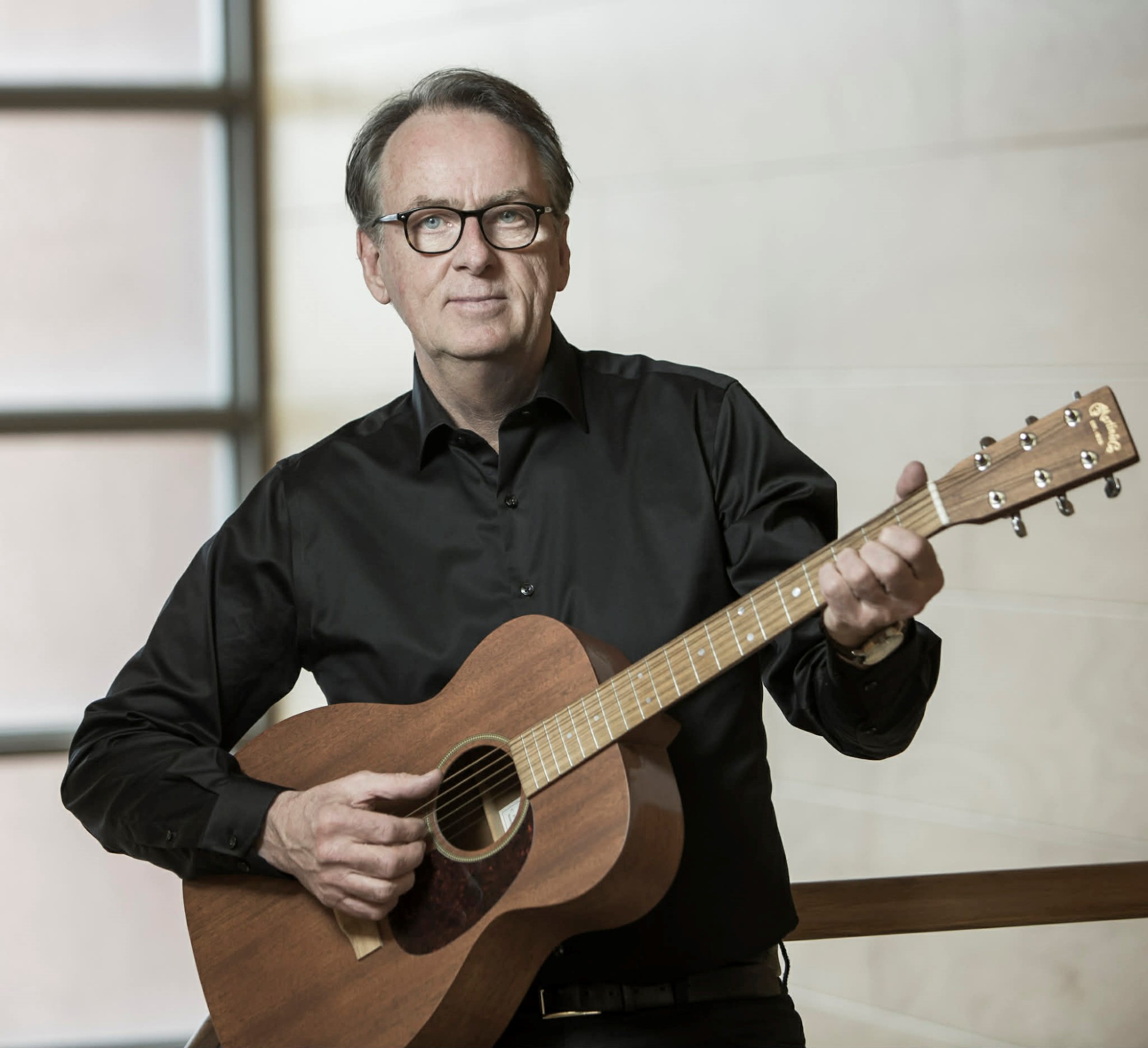 Bilde av Roland Utbult med gitar